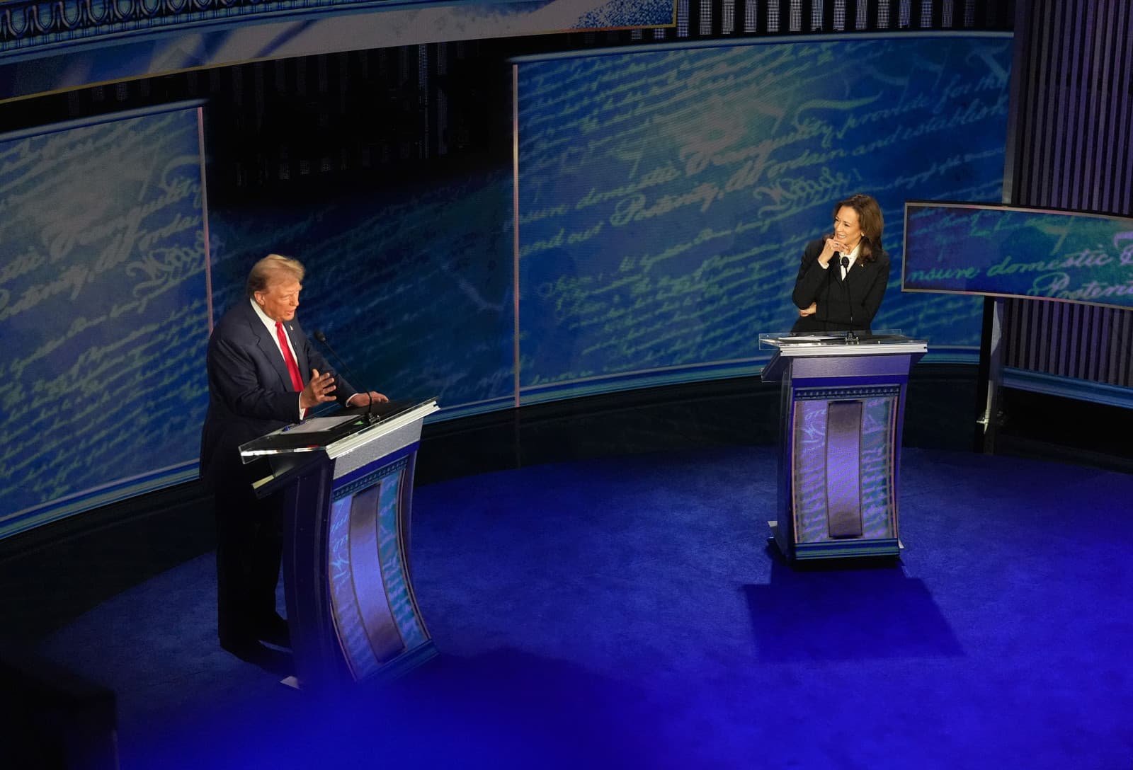 Donald Trump speaks as  Kamala Harris reacts during the presidential debate at National Constitution Center in Philadelphia, PA on Tuesday, Sept. 10, 2024 (Demetrius Freeman/The Washington Post via Getty Images)