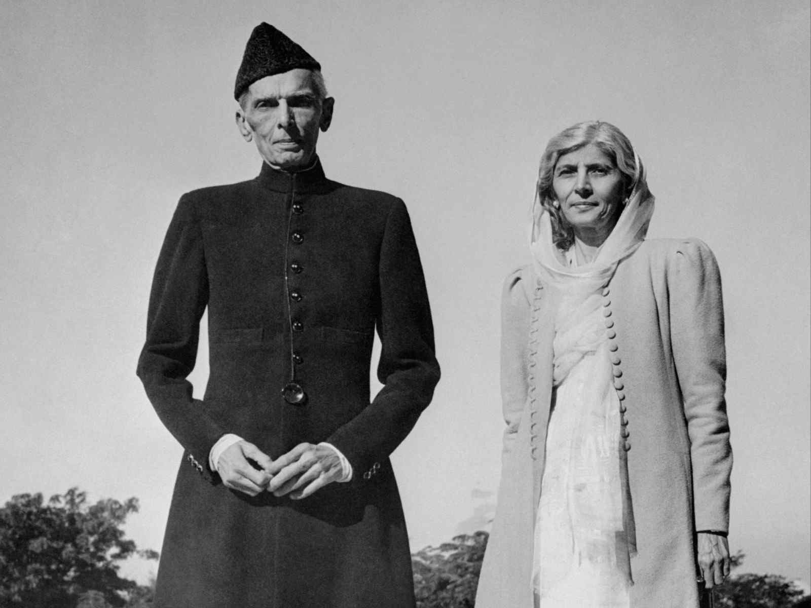 Celebrating his 72nd birthday, Mohammed Ali Jinnah, Governor-General of Pakistan, strolls on the lawn of the Government House at Karachi with his sister, Fatima (Getty Images)